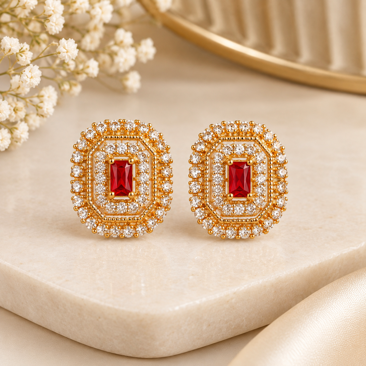 Statement stud earrings with single ruby red stone
